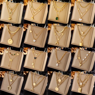 أوروبا والولايات المتحدة عبر الحدود أزياء الرجعية مطلي بالذهب مزدوجة الطبقات تتداخل مع عناصر متعددة قلادة فراشة لؤلؤة جولة العلامة التجارية قلادة